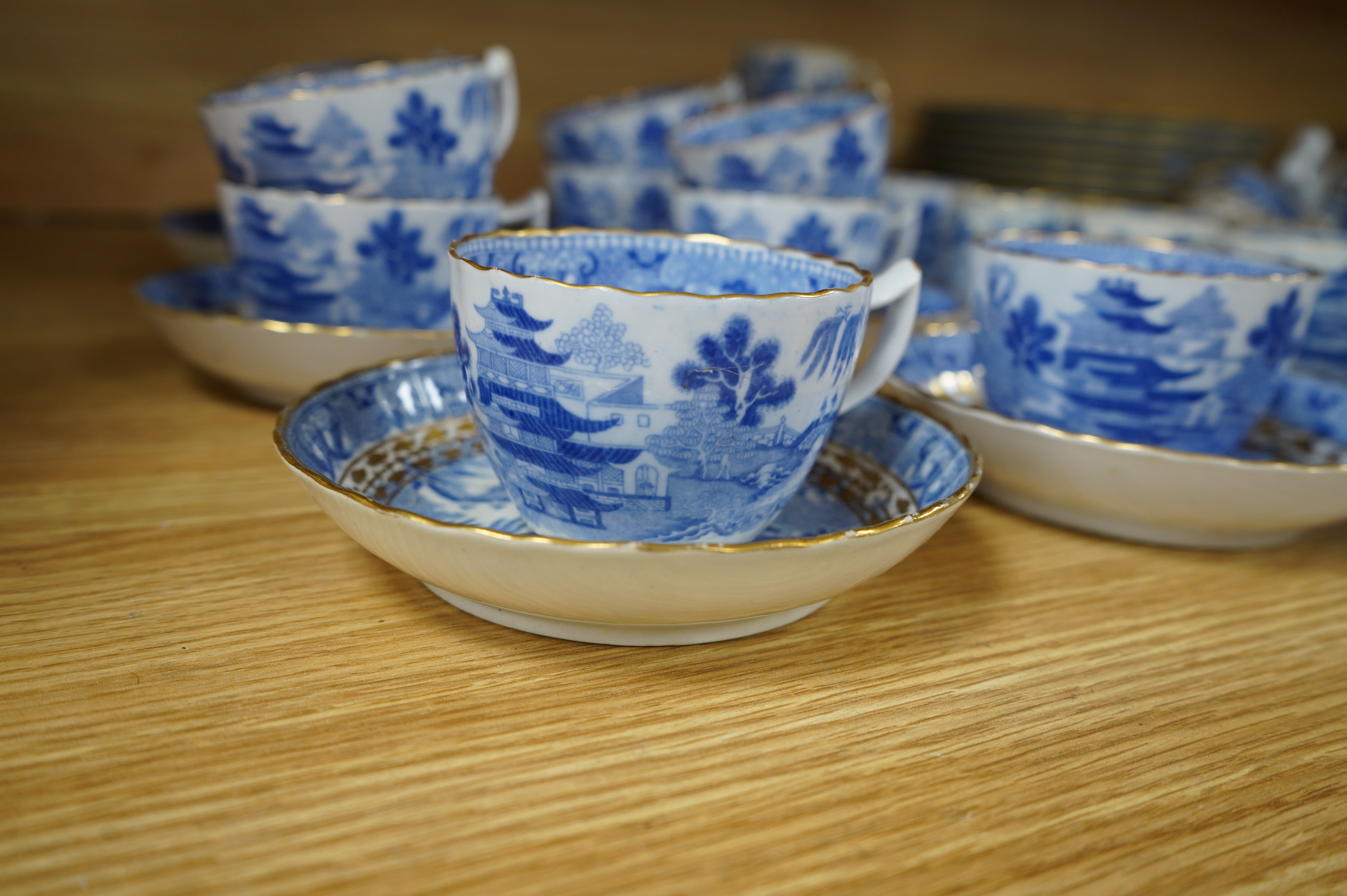 An early 19th century part coffee and tea set, probably Miles Mason, and a set of ten Derby dessert plates, 25cm in diameter. Condition - varies, poor to good